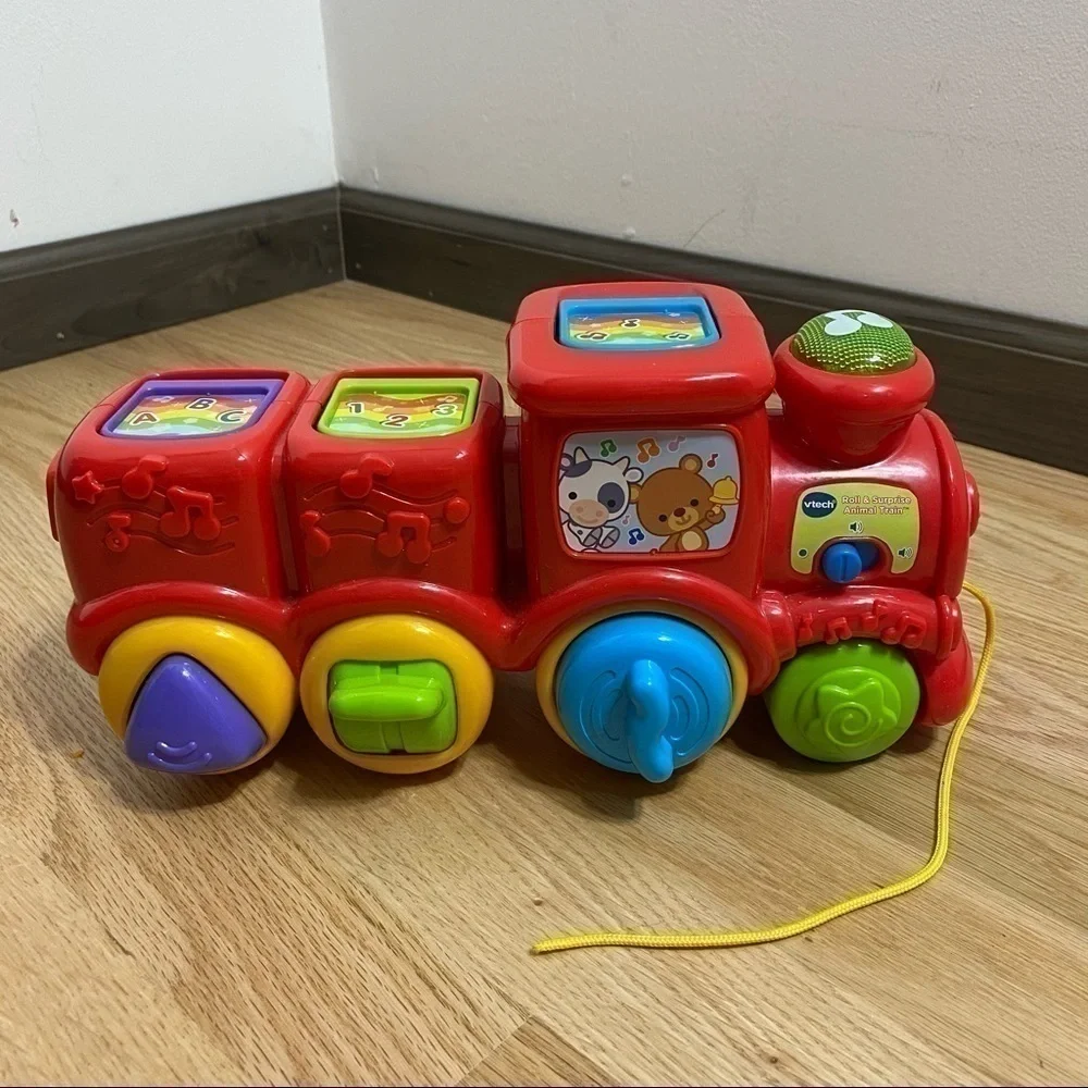 V-tech Roll & Surprise Animal Train Pop Up Music